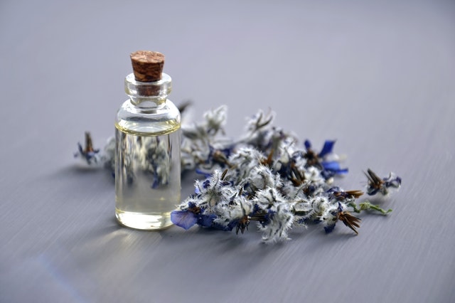 Qalbi Yoga aromatherapy bottle and herbs